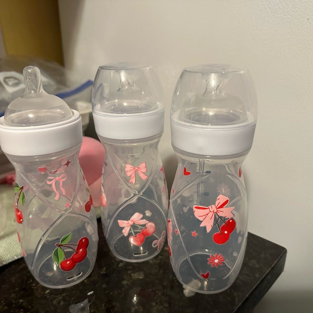 Playtex Baby Bottles with Pink and Red Designs